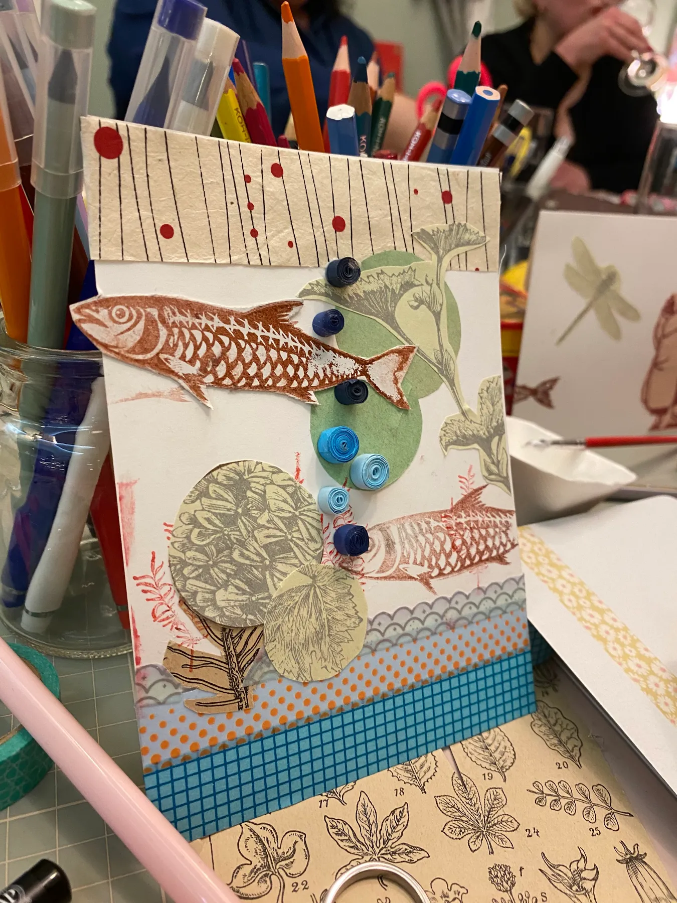 Quilling-Fisch aus gerollten Papierstreifen, entstanden in der Paper Night